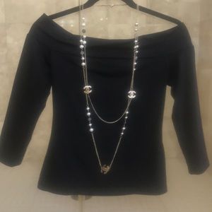 Beautiful off the shoulder 3/4 sleeves Susanna Monical versatile top.